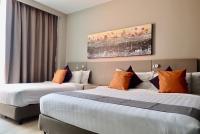Qliq Damansara Hotel客房内的一张或多张床位