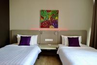 Qliq Damansara Hotel客房内的一张或多张床位