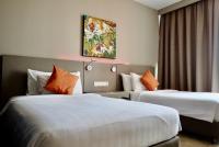 Qliq Damansara Hotel客房内的一张或多张床位