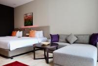 Qliq Damansara Hotel客房内的一张或多张床位