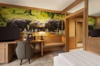 Amedia Hotel &amp; Suites Leipzig, Trademark Collection by Wyndham的电视和&#47;或娱乐中心