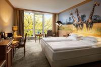 Amedia Hotel &amp; Suites Leipzig, Trademark Collection by Wyndham客房内的一张或多张床位