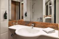 Amedia Hotel &amp; Suites Leipzig, Trademark Collection by Wyndham的一间浴室