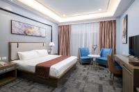 Sunlight Hotel Puerto Princesa客房内的一张或多张床位
