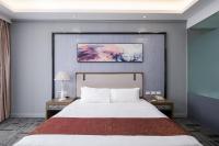 Sunlight Hotel Puerto Princesa客房内的一张或多张床位