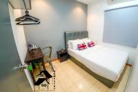 QQ Seremban Lovely HomeStay10R 4B客房内的一张或多张床位