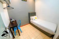 QQ Seremban Lovely HomeStay10R 4B客房内的一张或多张床位