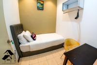 QQ Seremban Lovely HomeStay10R 4B客房内的一张或多张床位