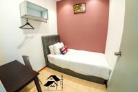 QQ Seremban Lovely HomeStay10R 4B客房内的一张或多张床位