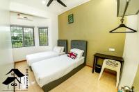 QQ Seremban Lovely HomeStay10R 4B客房内的一张或多张床位