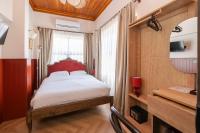 Saye Konak Hotel &#39; Kaleiçi&amp;Oldtown&#39;客房内的一张或多张床位