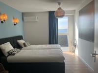 Residentie Oosterschelde的电视和/或娱乐中心