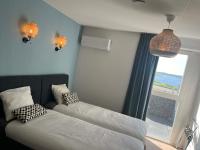 Residentie Oosterschelde客房内的一张或多张床位