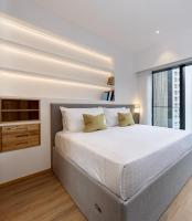 Shama Hub Metro South Hong Kong客房内的一张或多张床位