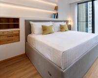 Shama Hub Metro South Hong Kong客房内的一张或多张床位