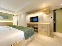 Urbanwood Hung Hom客房内的一张或多张床位