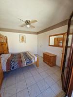 Villa 6p piscine spa privatif wifi proche des plages客房内的一张或多张床位