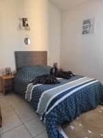 Villa 6 couchages spa privatif, accès direct mer, piscine客房内的一张或多张床位