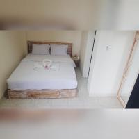 Ceria House Ungasan Uluwatu客房内的一张或多张床位