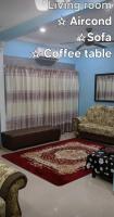 Maktok's Nilai Homestay客房内的一张或多张床位