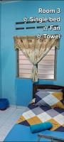 Maktok's Nilai Homestay客房内的一张或多张床位