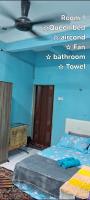Maktok's Nilai Homestay客房内的一张或多张床位