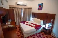 AL KARNAK HOTEL - BRANCH客房内的一张或多张床位