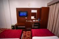 AL KARNAK HOTEL - BRANCH客房内的一张或多张床位