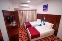 AL KARNAK HOTEL - BRANCH客房内的一张或多张床位