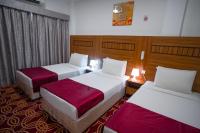 AL KARNAK HOTEL - BRANCH客房内的一张或多张床位