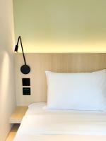 Urbanwood Hung Hom客房内的一张或多张床位