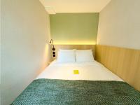 Urbanwood Hung Hom客房内的一张或多张床位