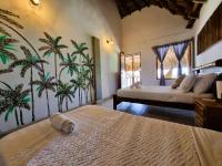 Kite Eco House Salinas del rey客房内的一张或多张床位