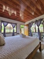 Kite Eco House Salinas del rey客房内的一张或多张床位