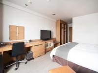 Vessel Inn Fukuyama Station的电视和/或娱乐中心