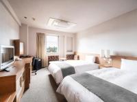 Vessel Inn Fukuyama Station客房内的一张或多张床位
