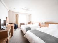 Vessel Inn Fukuyama Station客房内的一张或多张床位
