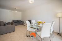 #154 V2 Vila Branca 54 by Home Holidays的休息区