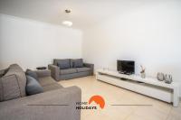 #154 V2 Vila Branca 54 by Home Holidays的休息区