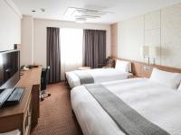 Vessel Inn Fukuyama Station客房内的一张或多张床位