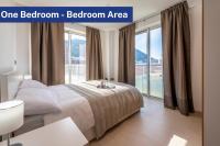 Bentley Holiday Apartments - West One客房内的一张或多张床位
