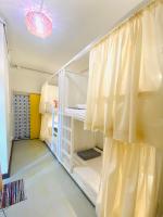 Chiza hostel Chiangmai客房内的一张或多张床位