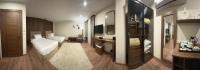 The Home Boutique Hotel Pyramids Inn客房内的一张或多张床位