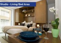 Bentley Holiday Apartments - West One客房内的一张或多张床位