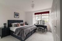 Crossriggs- Beautiful Detached Home客房内的一张或多张床位