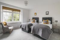 Crossriggs- Beautiful Detached Home客房内的一张或多张床位