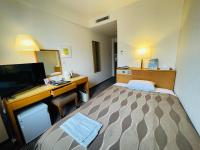 Center Hotel Narita1客房内的一张或多张床位