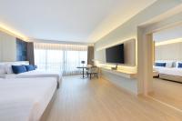 Centre Point Plus Hotel Pratunam客房内的一张或多张床位