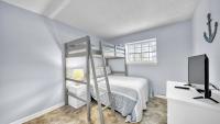 Cozy renovated ground floor unit - Golf Villa - on the Golf Course客房内的一张或多张床位