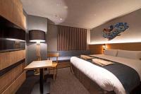 hotel around TAKAYAMA, Ascend Hotel Collection客房内的一张或多张床位